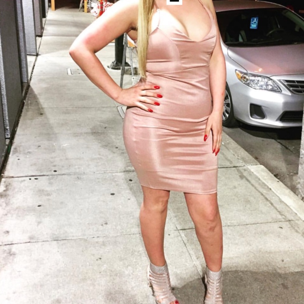 Blush tight clubbing dress.